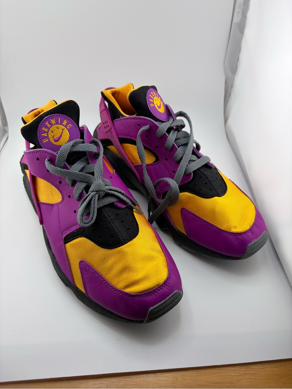 0235: Nike Air Huarache sneakers with a custom "DARKWING" tongue patch.